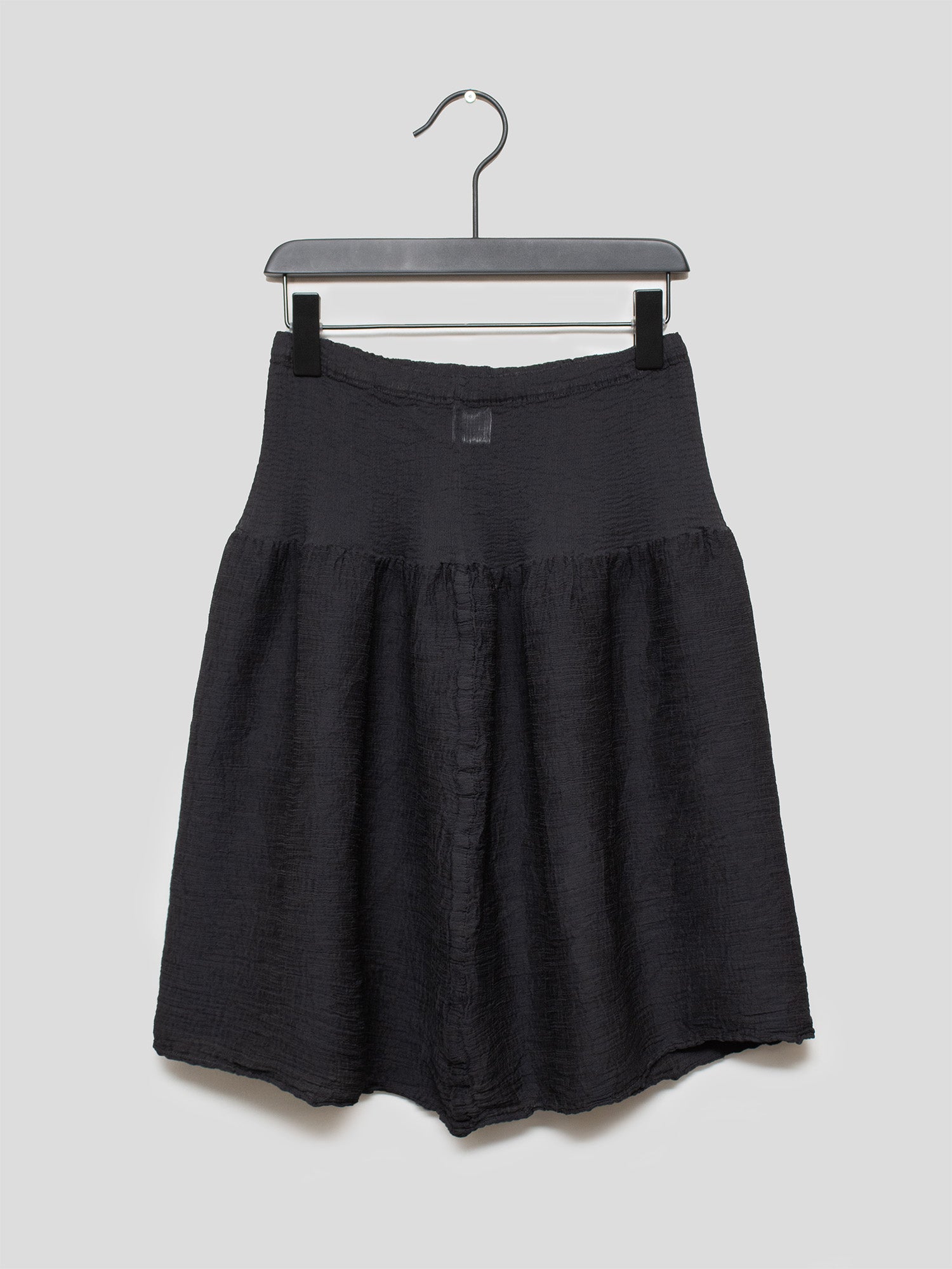 ME Micro-Pleat Peplum Skirt