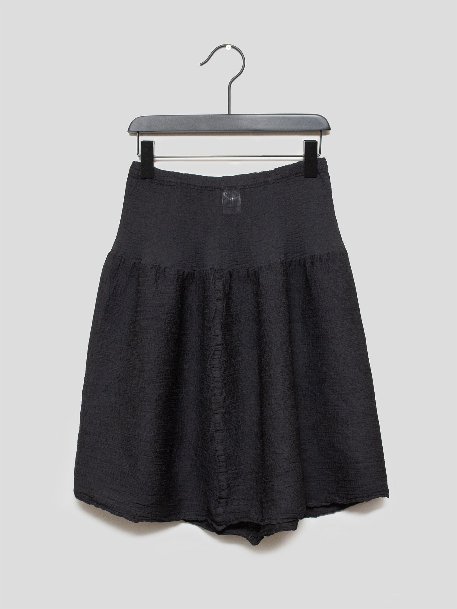 ME Micro-Pleat Peplum Skirt