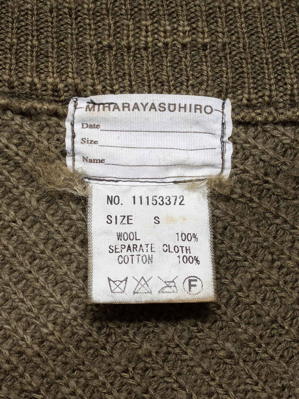 AW04 Twisted Zip-Up Sweater