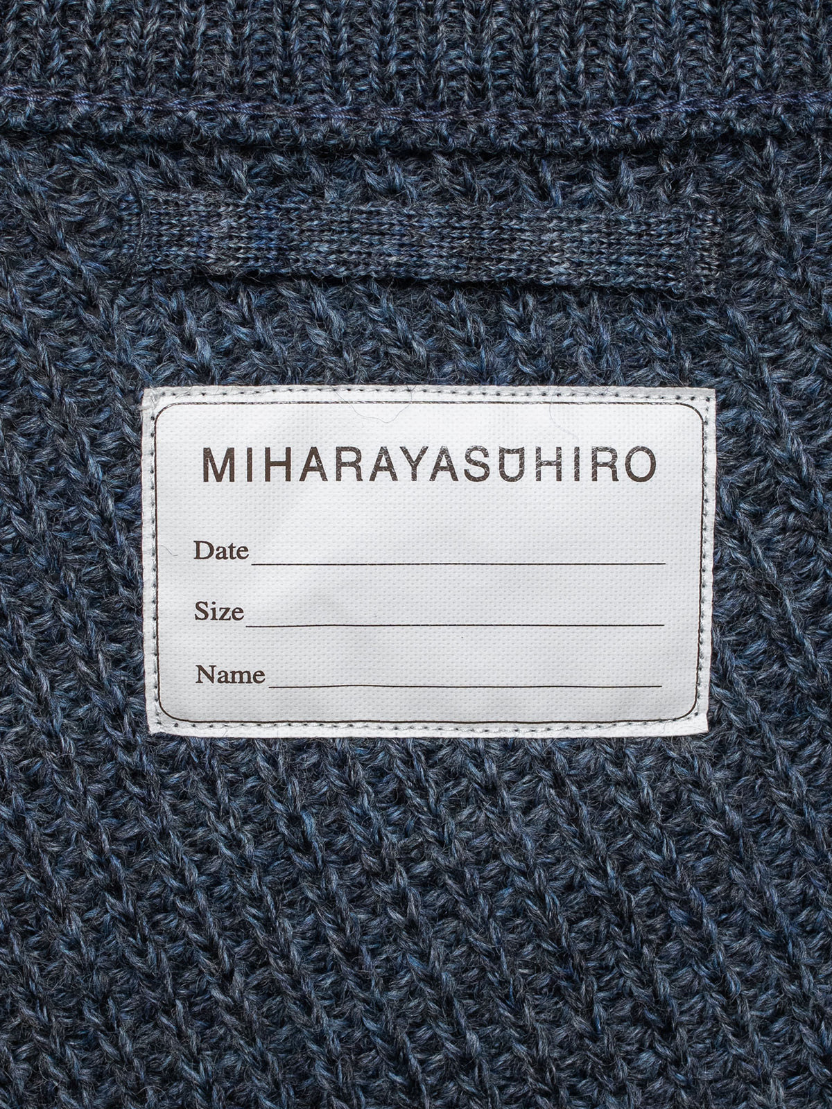 AW07 Twisted Zip-Up Sweater